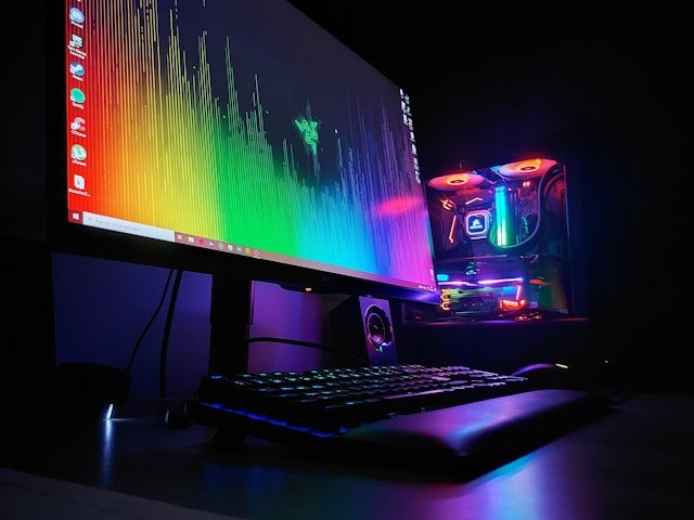 Close-up of a high-end Nvidia graphics card with RGB lighting inside a computer case.